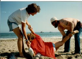 Beach revenge for Adria pouring sand down Eddie's pants, Santa Cruz 