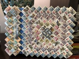 Photo album handmade of stamps and cigaretts packs while incarcerated for Adria