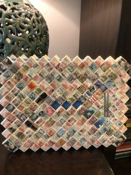 Photo album handmade of stamps and cigaretts packs, back 