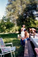 Eddie, Barbara, and Nick picnic in the park