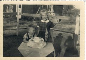 Eddie ready to pounce on the cake with playmate Jo Carol