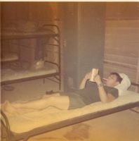 Eddie smoking and reading on his down time